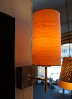 sconce lamp in maple wood against wall 1